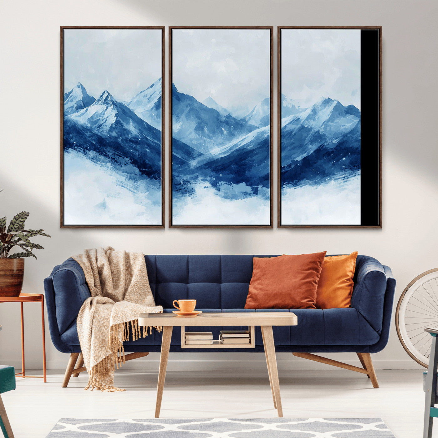 Peaceful watercolor-style painting of snowy blue mountains in soft tones, perfect for winter-themed or minimalist wall decor.