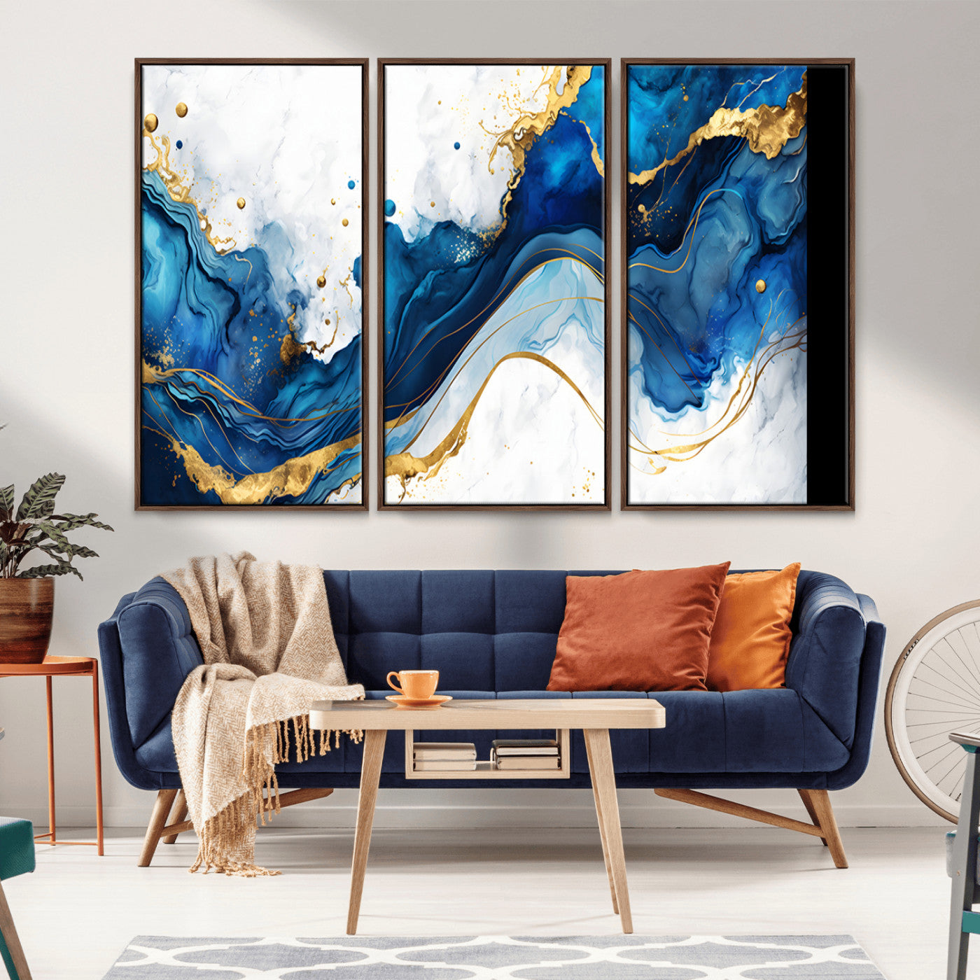 Elegant abstract canvas in cobalt blue and gold tones, featuring marble waves and fluid motion, ideal for luxe interior styling.
