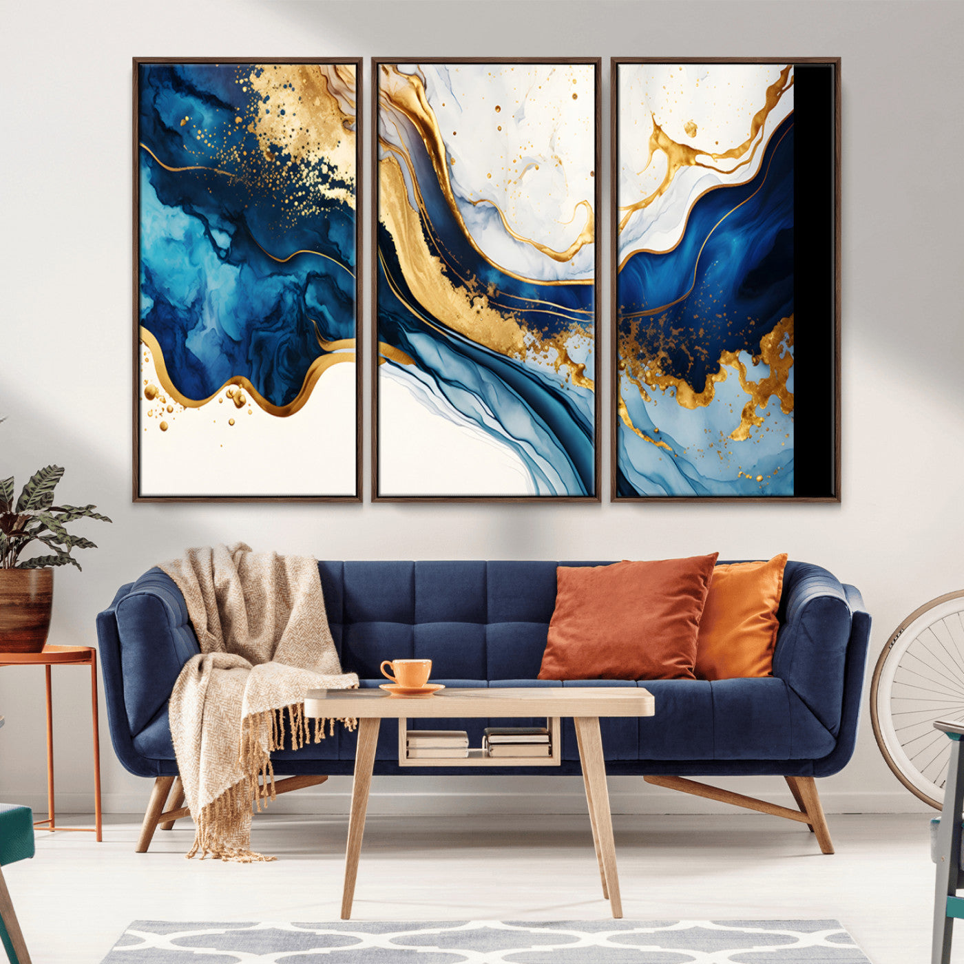 Canvas artwork with fluid blue and gold marbling, perfect for modern luxe or elegant abstract home decor styles.