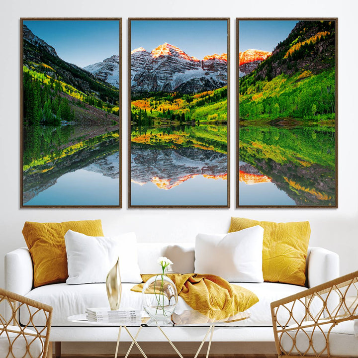 The Sunrise Maroon Bells Lake Wall Art Print beautifully captures North Maroon Peak mirrored in the tranquil lake, framed by lush greenery.