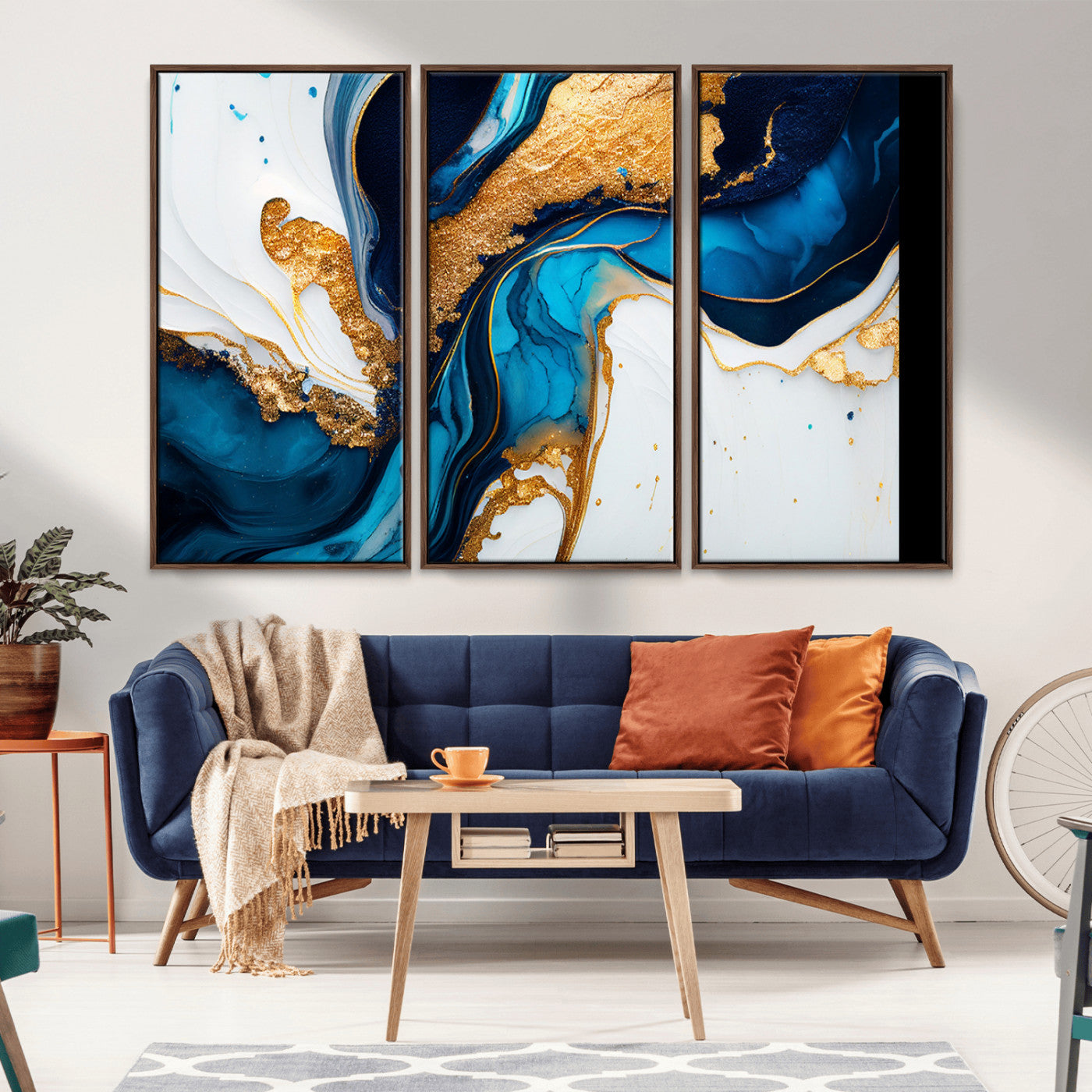 Luxurious abstract canvas in gold, navy, and teal tones with fluid marble patterns, perfect for modern glam or upscale interiors.