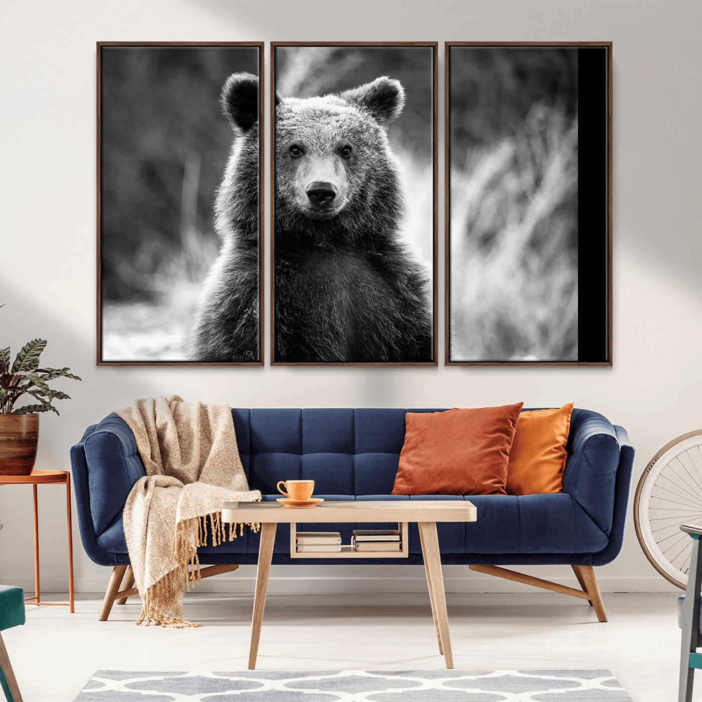Black and white portrait of a grizzly bear with sharp detail and intense gaze, ideal for neutral-toned wildlife or rustic nature decor.
