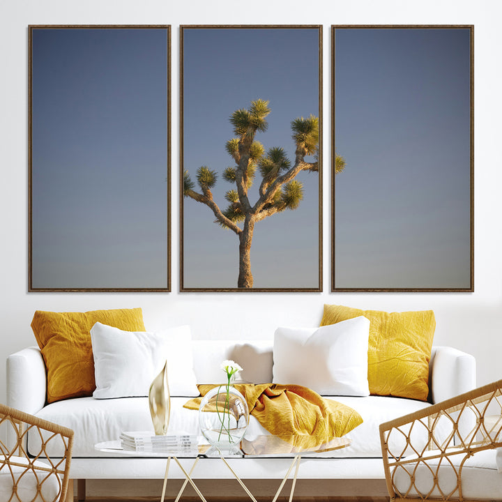 A lone Joshua Tree standing against a deep blue sky, capturing the serene and rugged beauty of the Southwestern desert landscape.