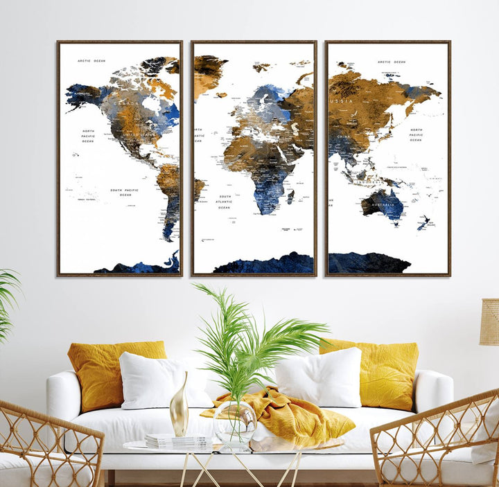 The Triptych Modern World Map Canvas in blue and brown is an ideal global decor piece for enhancing living rooms or offices. It comes ready to hang.