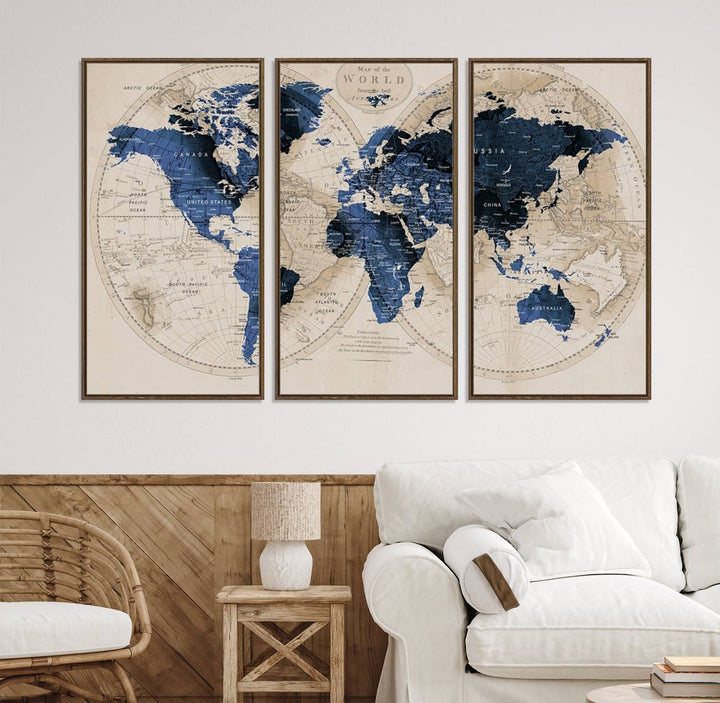 The Vintage Triptych Map Print is a grunge-stained blue and beige world map, perfect for enhancing wall decor.