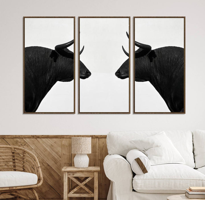 Spanish Bull Wall Art Canvas Print: Two black bull heads facing off on museum-quality canvas.