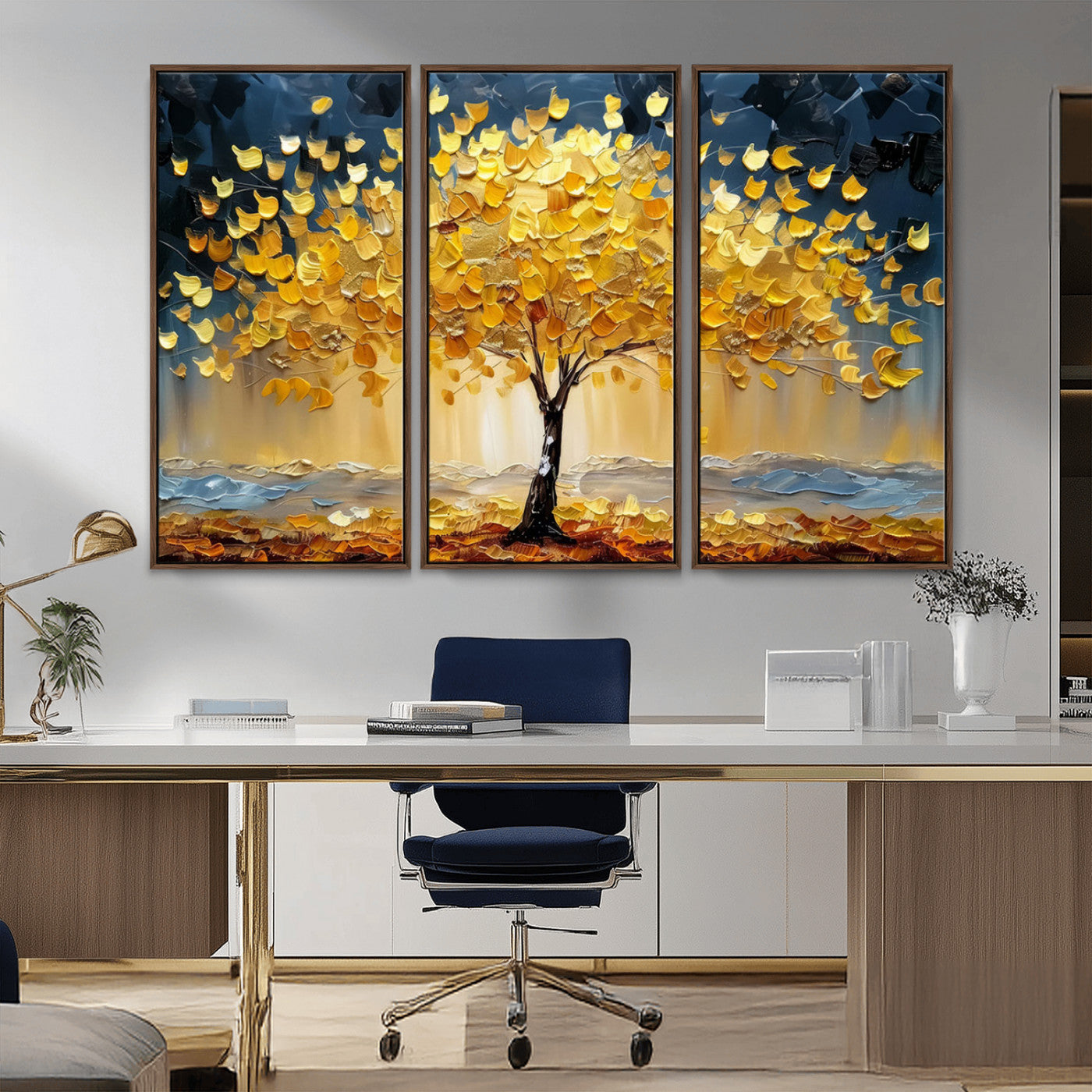 Canvas of a golden autumn tree with textured brushstrokes and moody blue skies, perfect for dramatic and vibrant home decor.