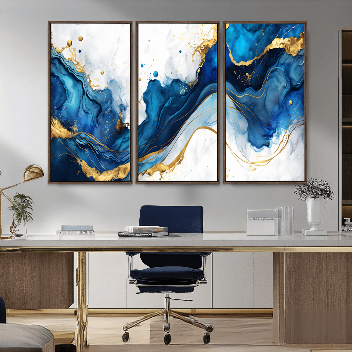 Elegant abstract canvas in cobalt blue and gold tones, featuring marble waves and fluid motion, ideal for luxe interior styling.