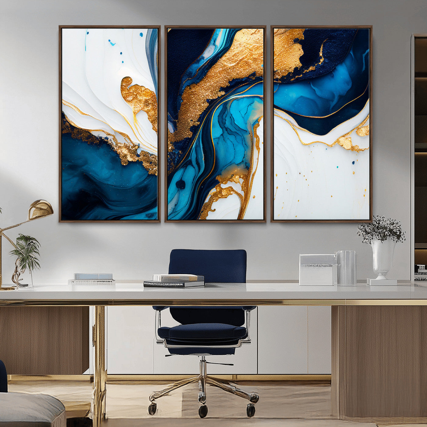 Luxurious abstract canvas in gold, navy, and teal tones with fluid marble patterns, perfect for modern glam or upscale interiors.