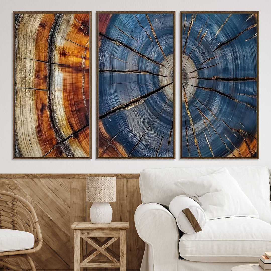 Close-up of blue, brown, and orange wood grain rings on the Abstract Tree Rings Canvas Wall Art Print.