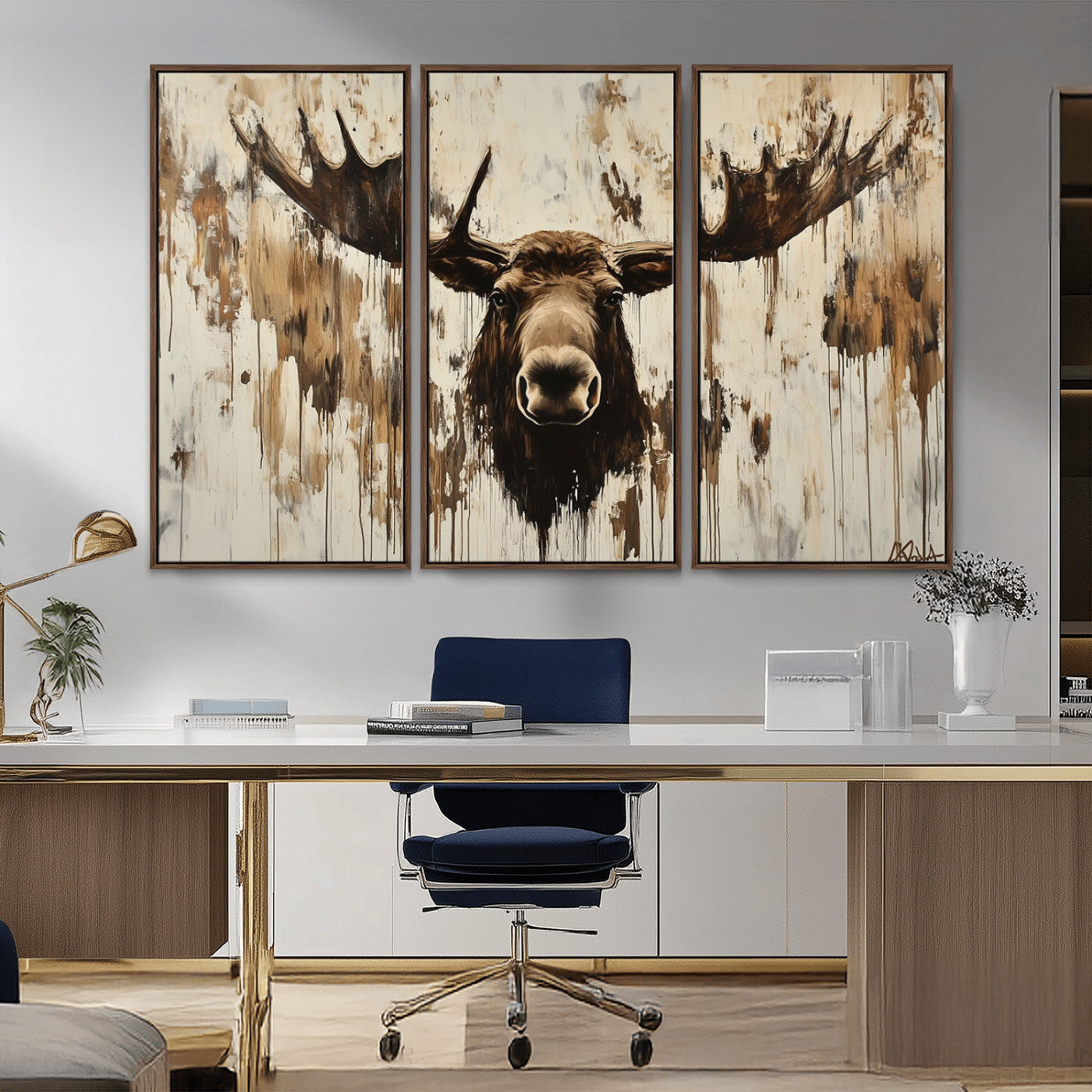 Expressive painting of a moose head with wide antlers in dark brown and beige tones, featuring paint drips and splatters on a light textured background, creating a striking rustic wall art canvas.