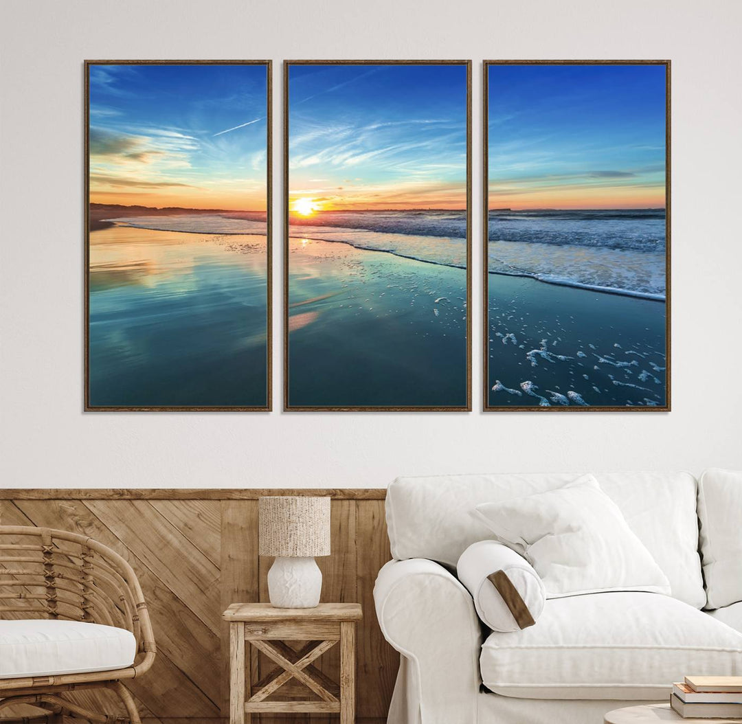 The Blue Sky and Beach Wall Art Canvas Print features a vibrant orange sky reflecting on wet sand.