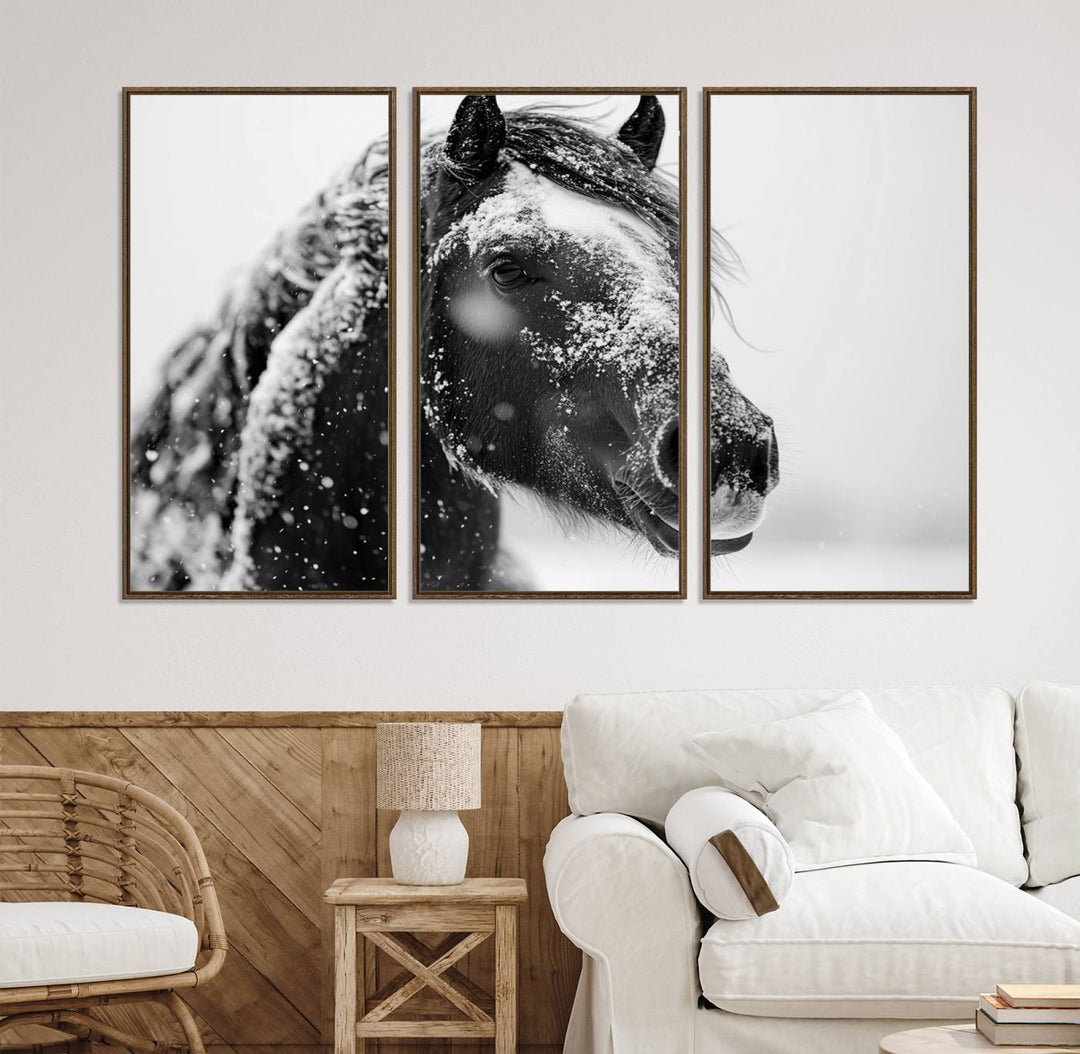 A large 3-panel rustic farmhouse wall art showcases a black and white winter horse canvas print against a snowy backdrop.