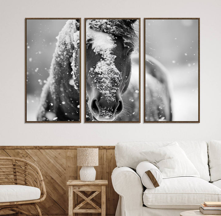 The Black and White Horse Winter Wall Art features a majestic horse with snow-covered hair set against a serene winter backdrop.