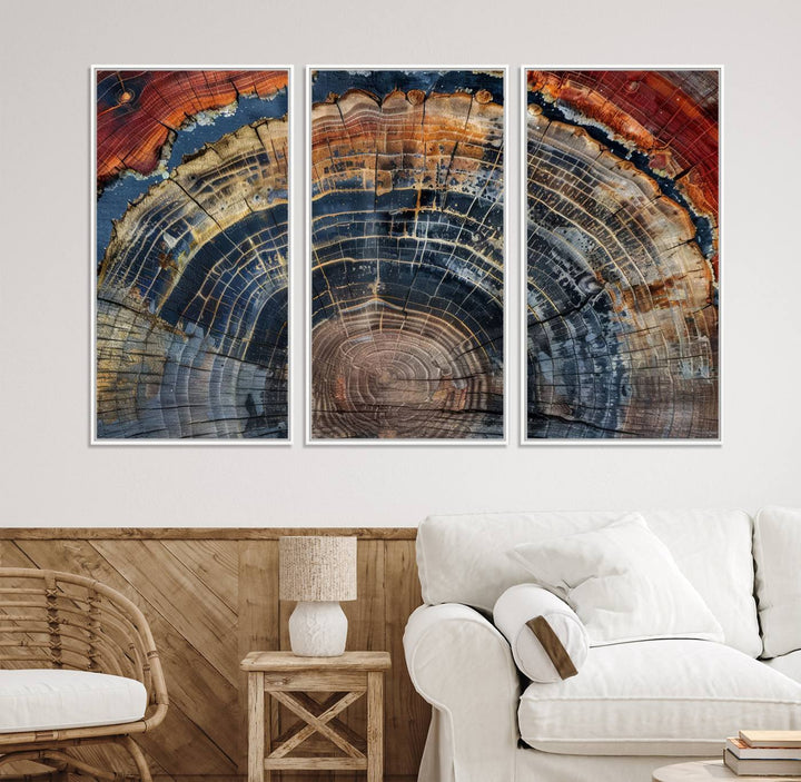 The Abstract Tree Ring Wall Art in orange, blue, and gray perfectly complements minimalist nature-inspired home decor.
