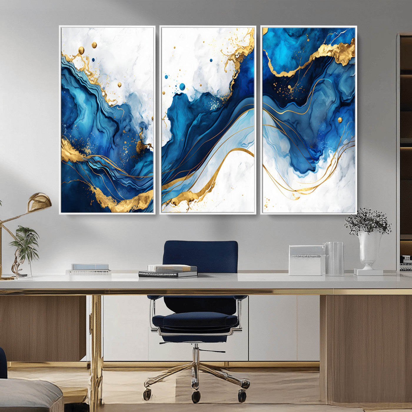 Elegant abstract canvas in cobalt blue and gold tones, featuring marble waves and fluid motion, ideal for luxe interior styling.
