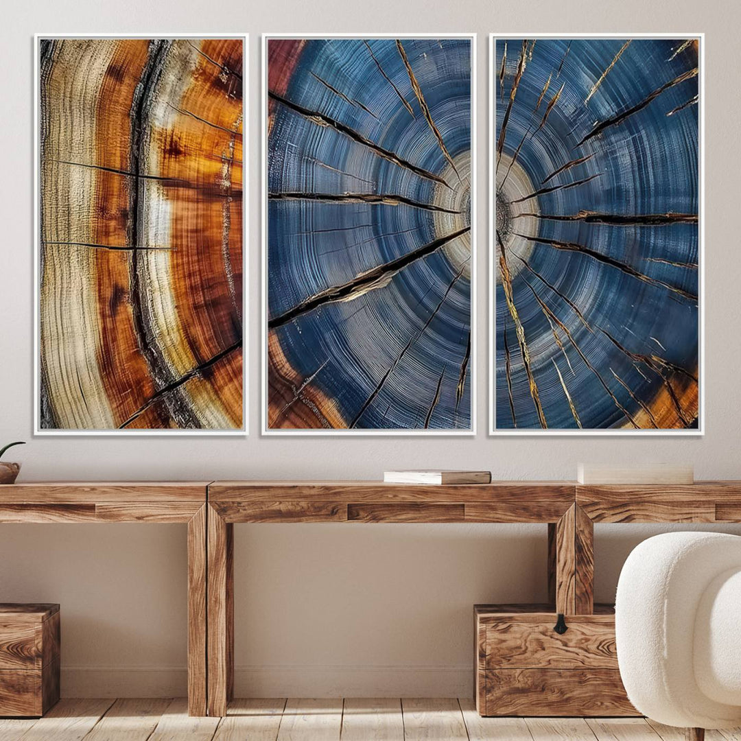 Close-up of blue, brown, and orange wood grain rings on the Abstract Tree Rings Canvas Wall Art Print.