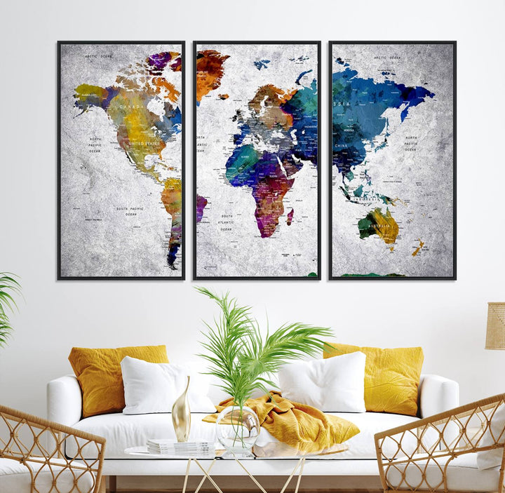 The World Map Art Canvas Print, featuring country names on a grunge-stained gray background, is perfect for stylish home decor.