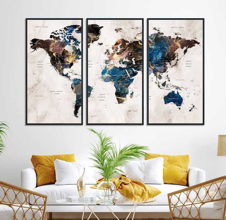 Abstract earth-toned 3-panel world map wall art featuring blues and browns, ready to hang; it showcases continents on modern canvas.