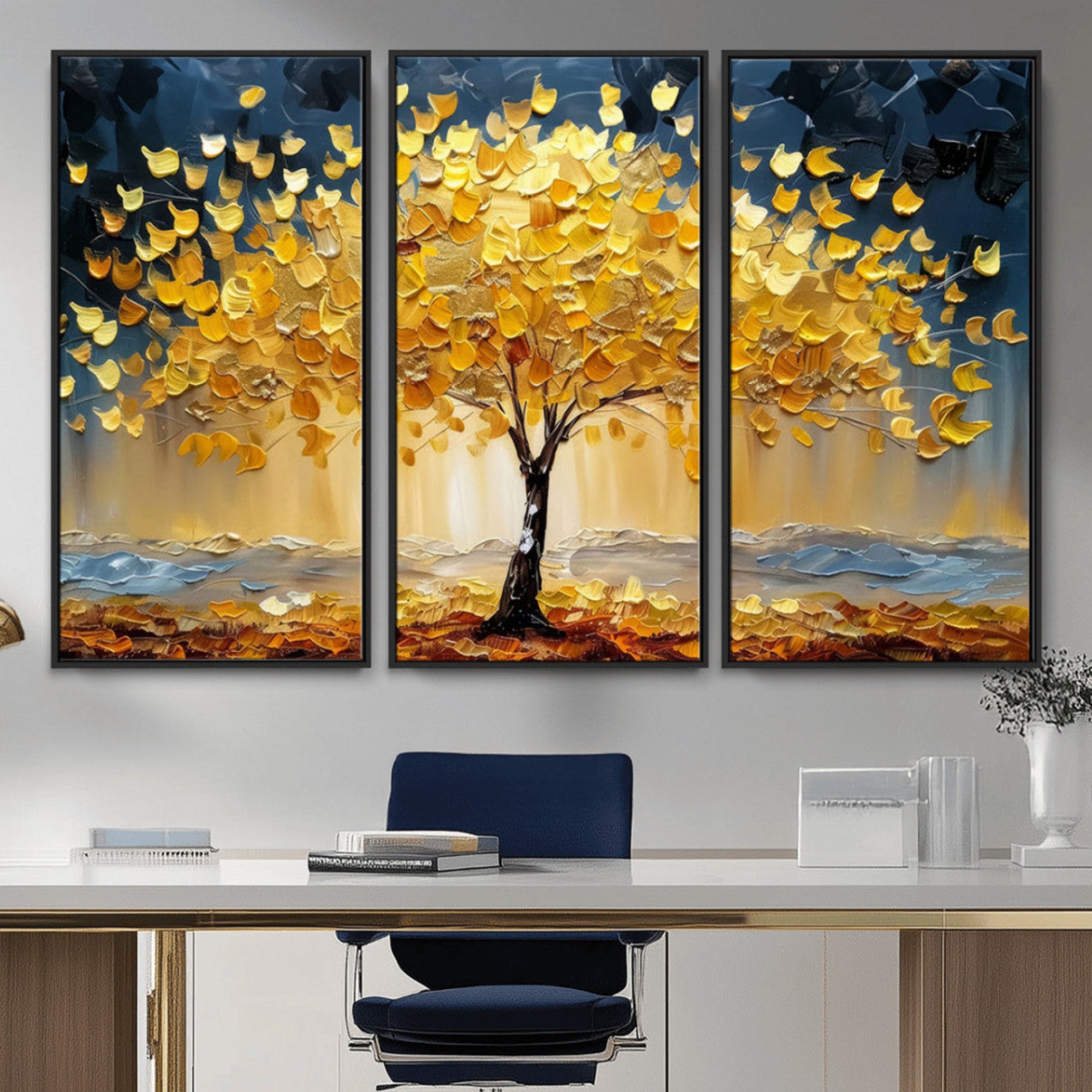 Canvas of a golden autumn tree with textured brushstrokes and moody blue skies, perfect for dramatic and vibrant home decor.