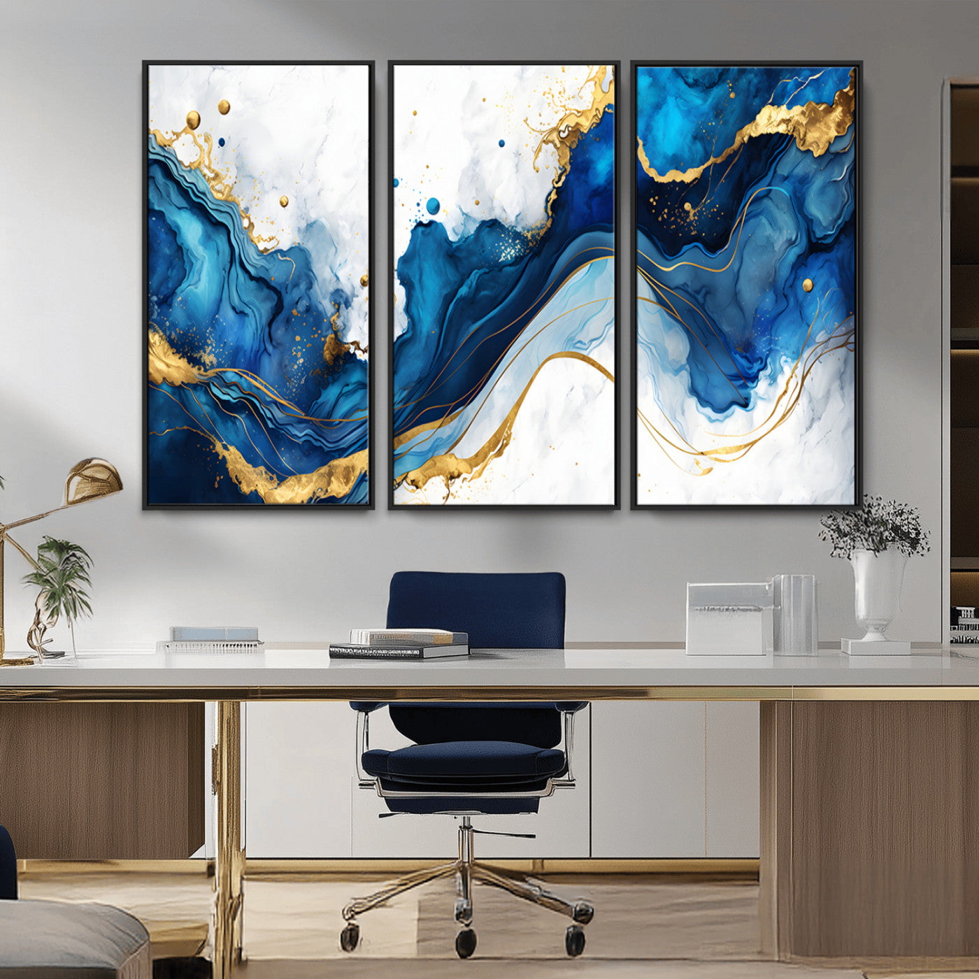 Elegant abstract canvas in cobalt blue and gold tones, featuring marble waves and fluid motion, ideal for luxe interior styling.