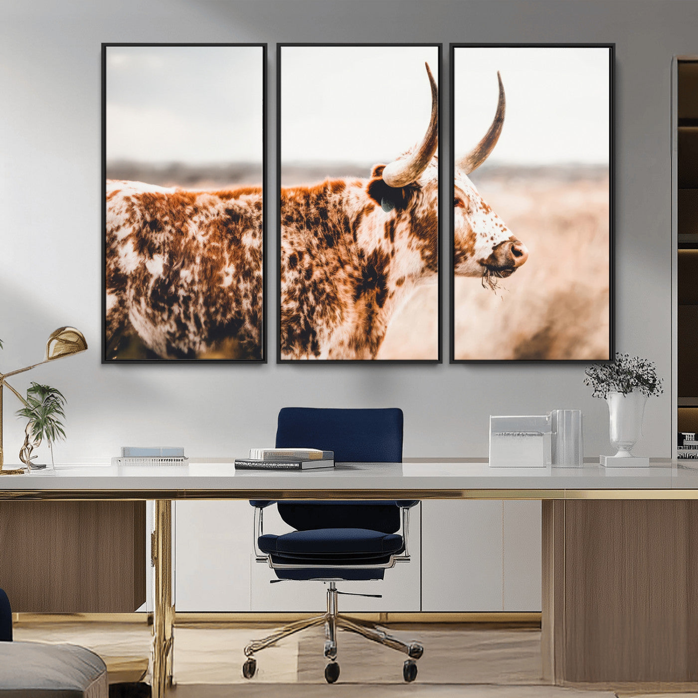 Speckled Texas longhorn with curved horns standing in a warm-toned prairie, perfect for rustic or country-style home decor.