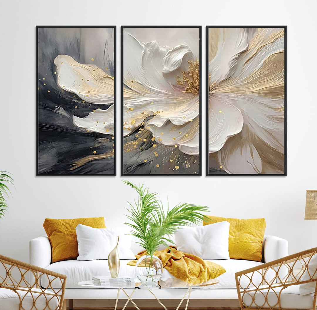 Elegant White and Gold Floral Triptych Canvas Art, a modern textured flower painting for home or office decor, features a blurred gray background.