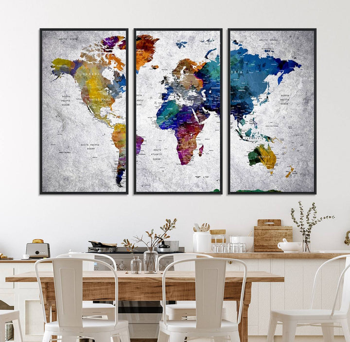 The World Map Art Canvas Print, featuring country names on a grunge-stained gray background, is perfect for stylish home decor.