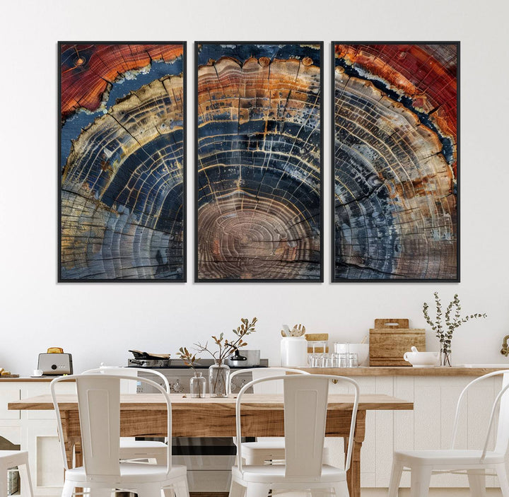 The Abstract Tree Ring Wall Art in orange, blue, and gray perfectly complements minimalist nature-inspired home decor.