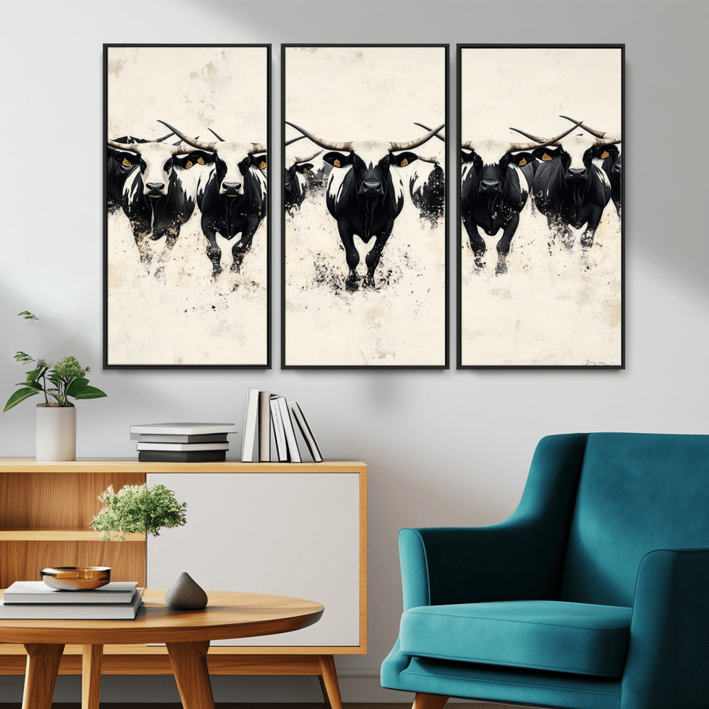 Canvas artwork of black and white Texas longhorns in a bold stampede over a minimalist background, ideal for rustic modern or Western-themed decor.
