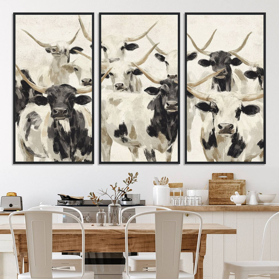 Canvas print titled Longhorn Texas Cow Drawing, depicting longhorn cattle with black and white markings, made in the USA, displayed on the wall.