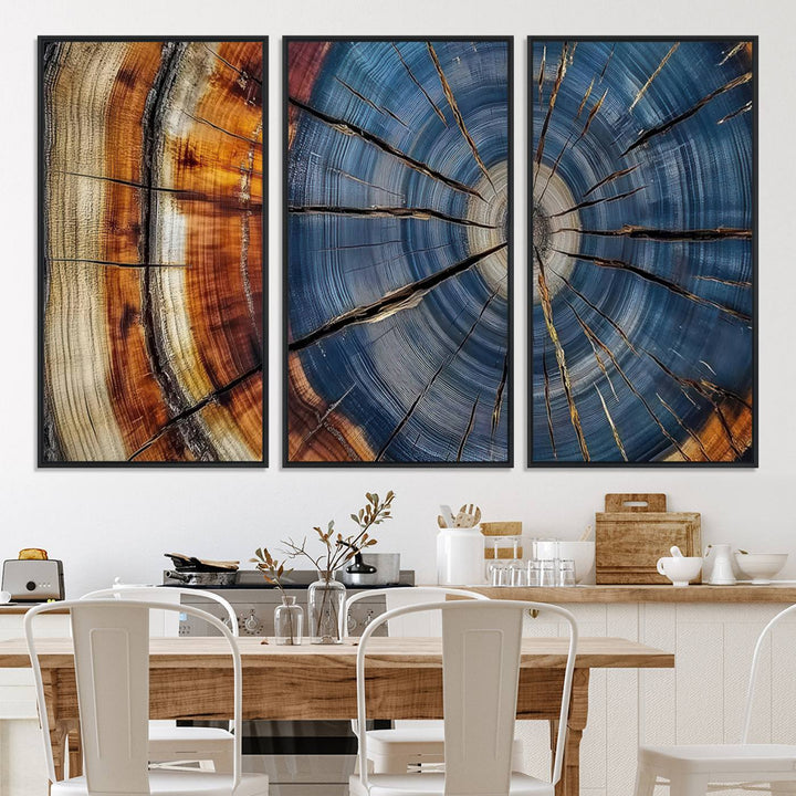 Close-up of blue, brown, and orange wood grain rings on the Abstract Tree Rings Canvas Wall Art Print.