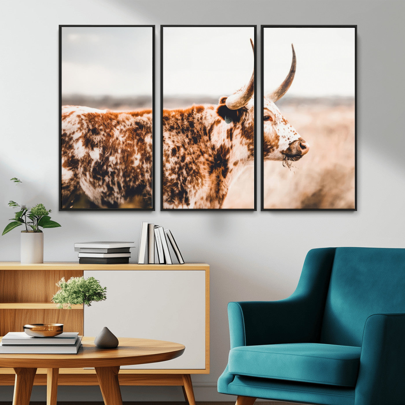 Speckled Texas longhorn with curved horns standing in a warm-toned prairie, perfect for rustic or country-style home decor.