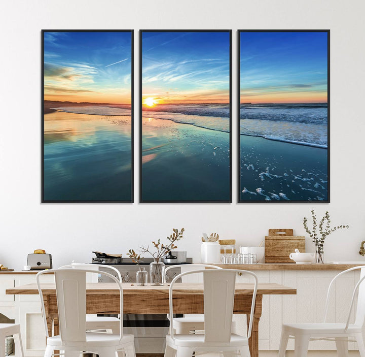 The Blue Sky and Beach Wall Art Canvas Print features a vibrant orange sky reflecting on wet sand.