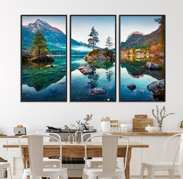 The 3-panel wall art showcases a serene mountain lake with rocky islands and trees, creating an ideal focal point for dining rooms or offices.