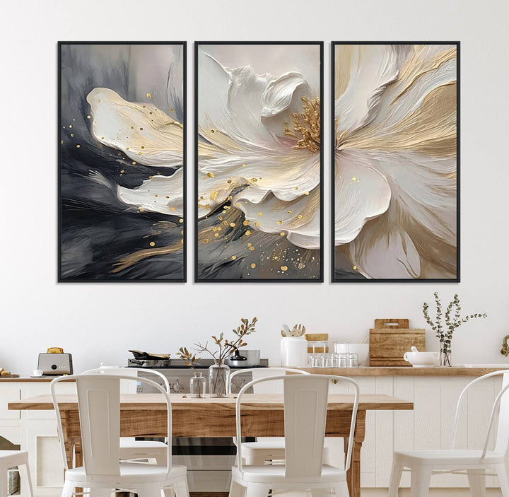 Elegant White and Gold Floral Triptych Canvas Art, a modern textured flower painting for home or office decor, features a blurred gray background.