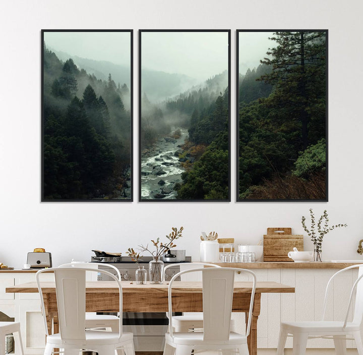 The Misty Forest Wall Art features a serene landscape with a misty river and evergreens, ideal for enhancing the ambiance of any living room or cabin.