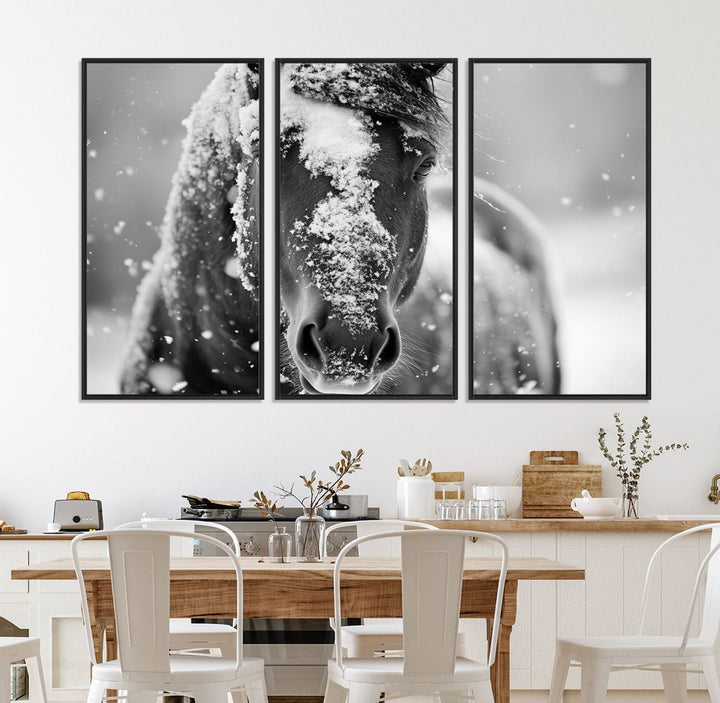 The Black and White Horse Winter Wall Art features a majestic horse with snow-covered hair set against a serene winter backdrop.