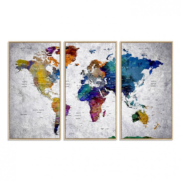 The World Map Art Canvas Print, featuring country names on a grunge-stained gray background, is perfect for stylish home decor.