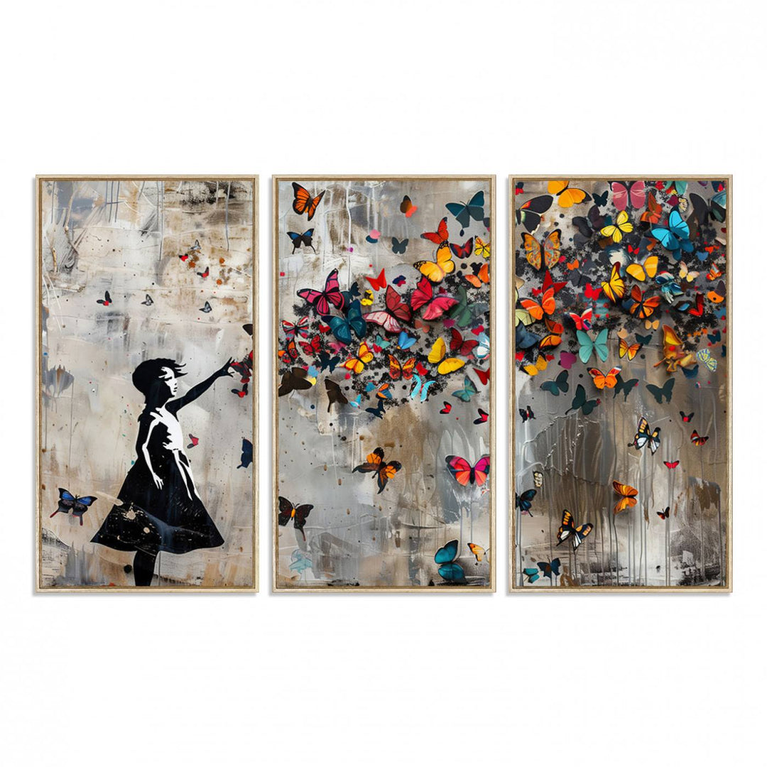 The Banksy Butterfly Girl 3-Piece Modern Graffiti Canvas Wall Art features a silhouette of a girl reaching for butterflies.