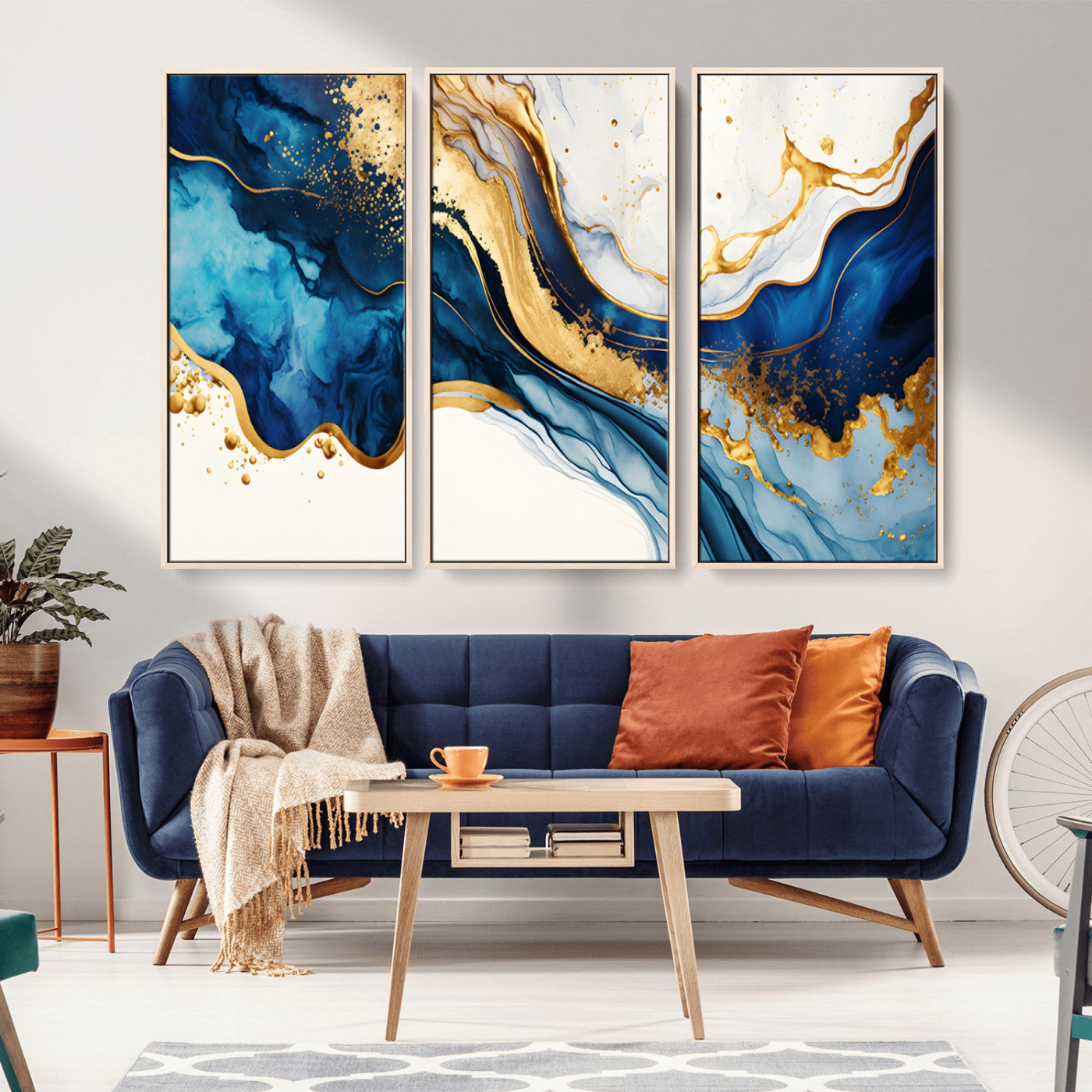 Canvas artwork with fluid blue and gold marbling, perfect for modern luxe or elegant abstract home decor styles.