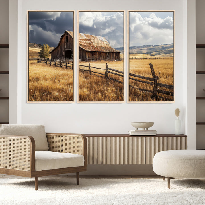 Canvas of a weathered wooden barn in a golden field under a dramatic sky, perfect for rustic or farmhouse-style wall decor.