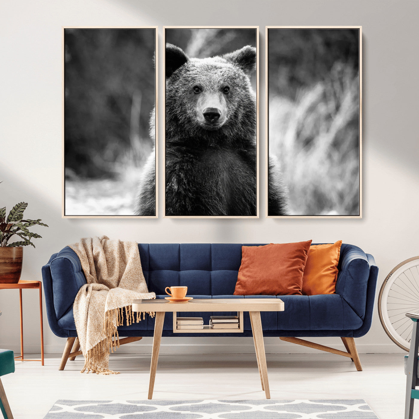Black and white portrait of a grizzly bear with sharp detail and intense gaze, ideal for neutral-toned wildlife or rustic nature decor.