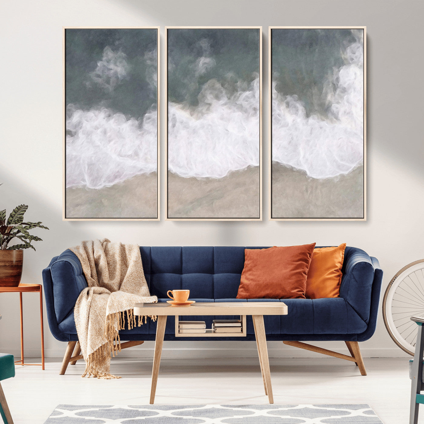 Wall art canvas print featuring foamy ocean waves softly rolling onto a sandy shore with a dreamy, painterly texture.
