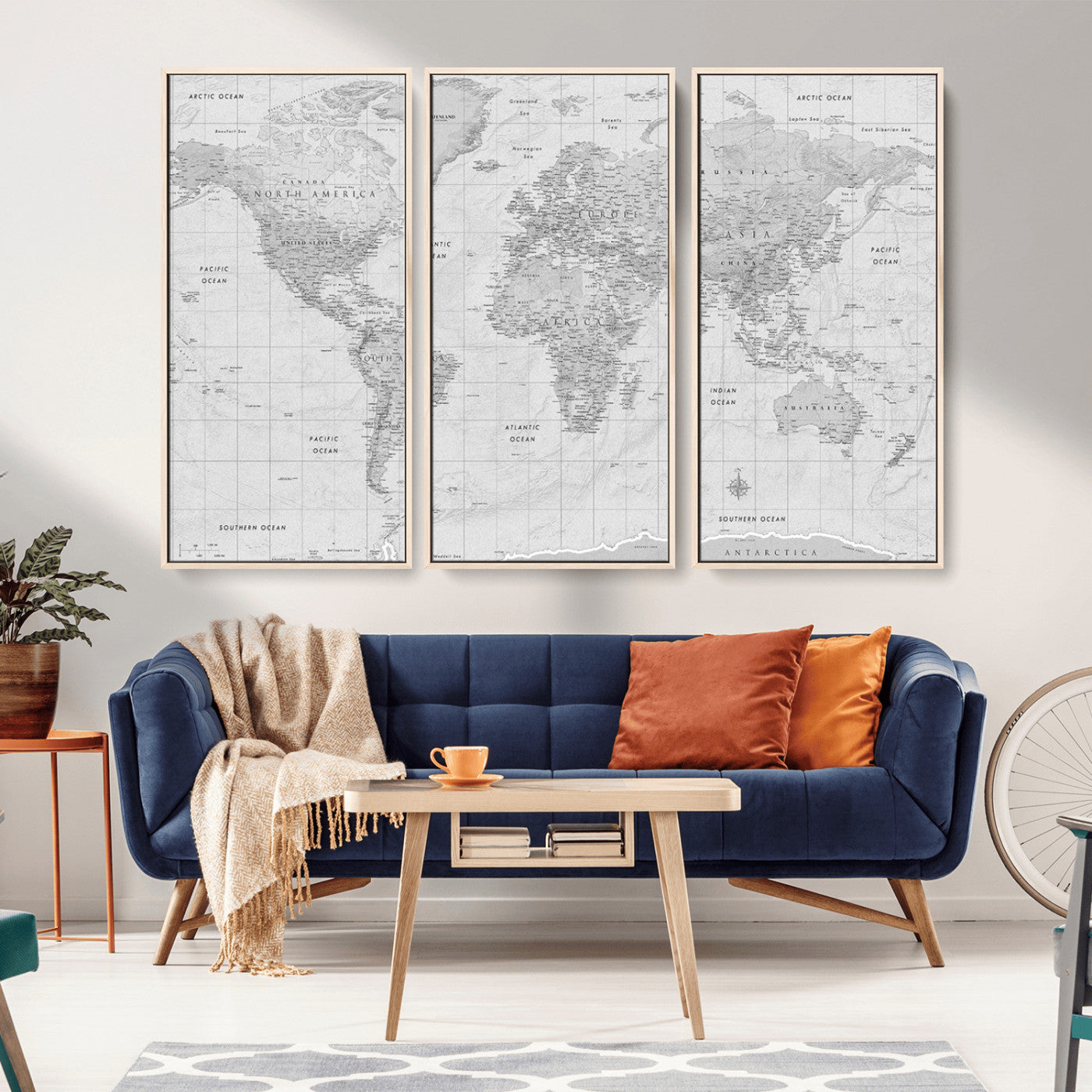 Grayscale vintage world map with detailed country borders, oceans, continents, and major cities on a textured parchment background.
