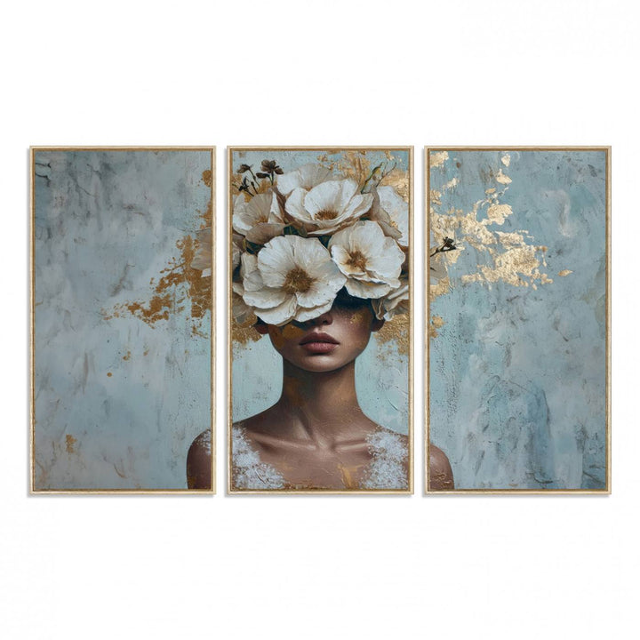 Golden Petal Wall Art: A womans face adorned with a gold floral design on a teal background, presented in a 3-panel modern glam canvas.