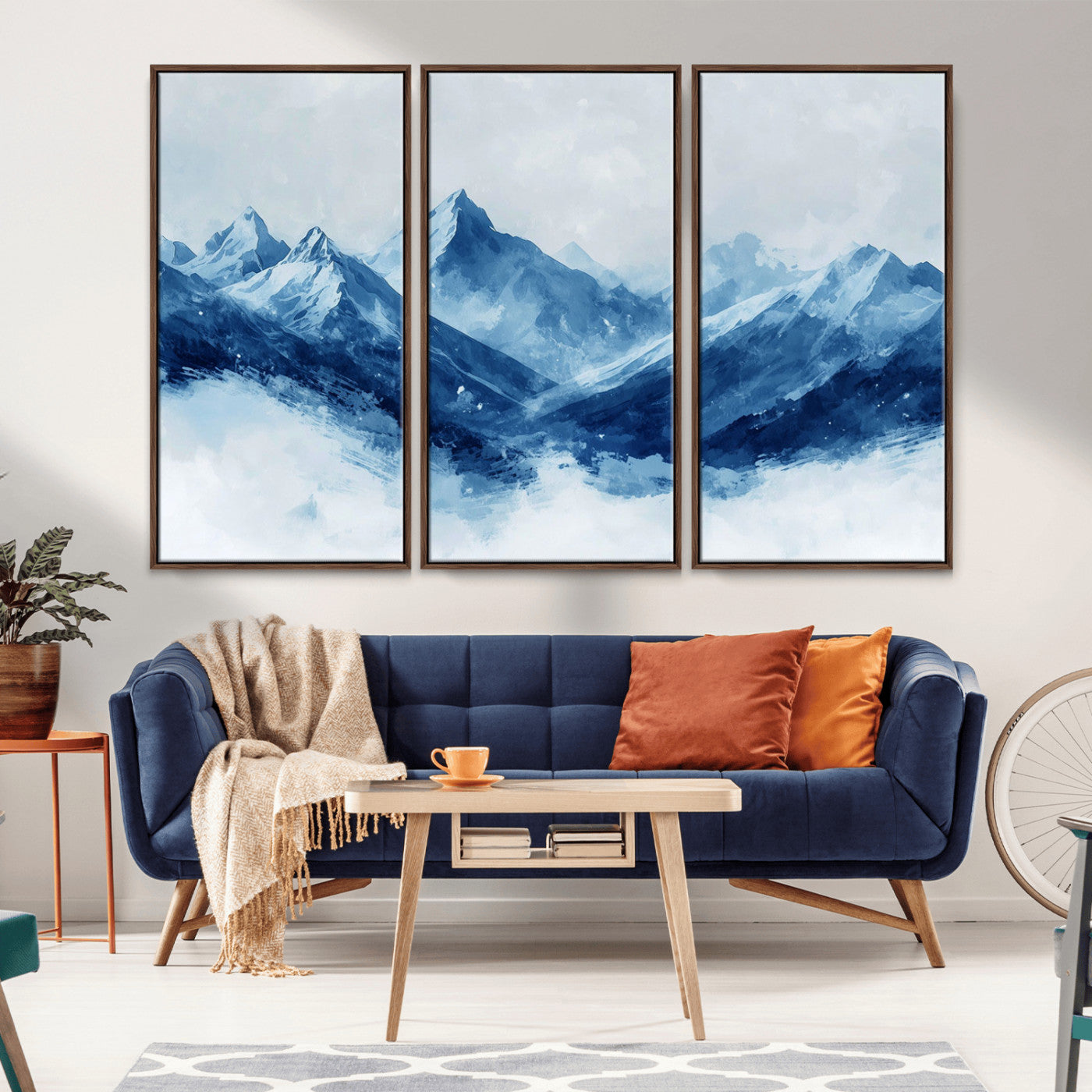 Peaceful watercolor-style painting of snowy blue mountains in soft tones, perfect for winter-themed or minimalist wall decor.