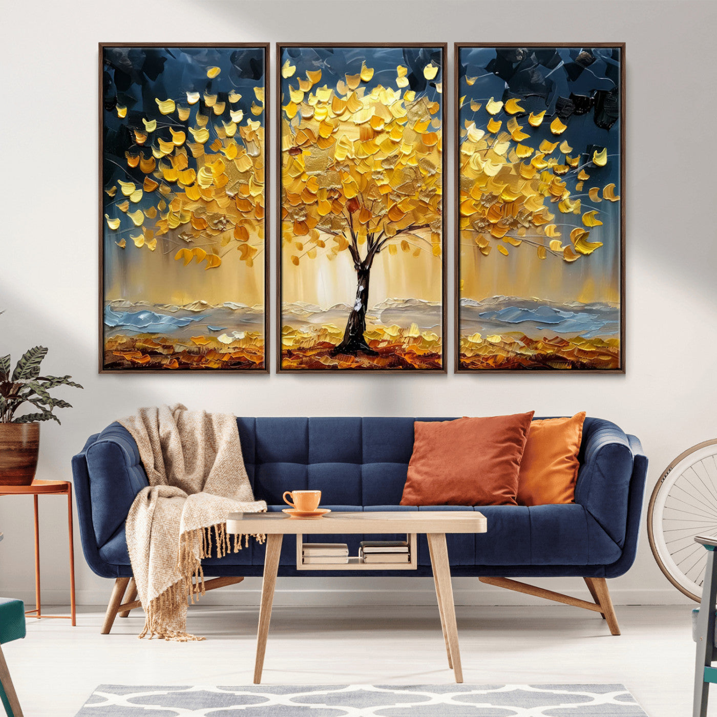 Canvas of a golden autumn tree with textured brushstrokes and moody blue skies, perfect for dramatic and vibrant home decor.