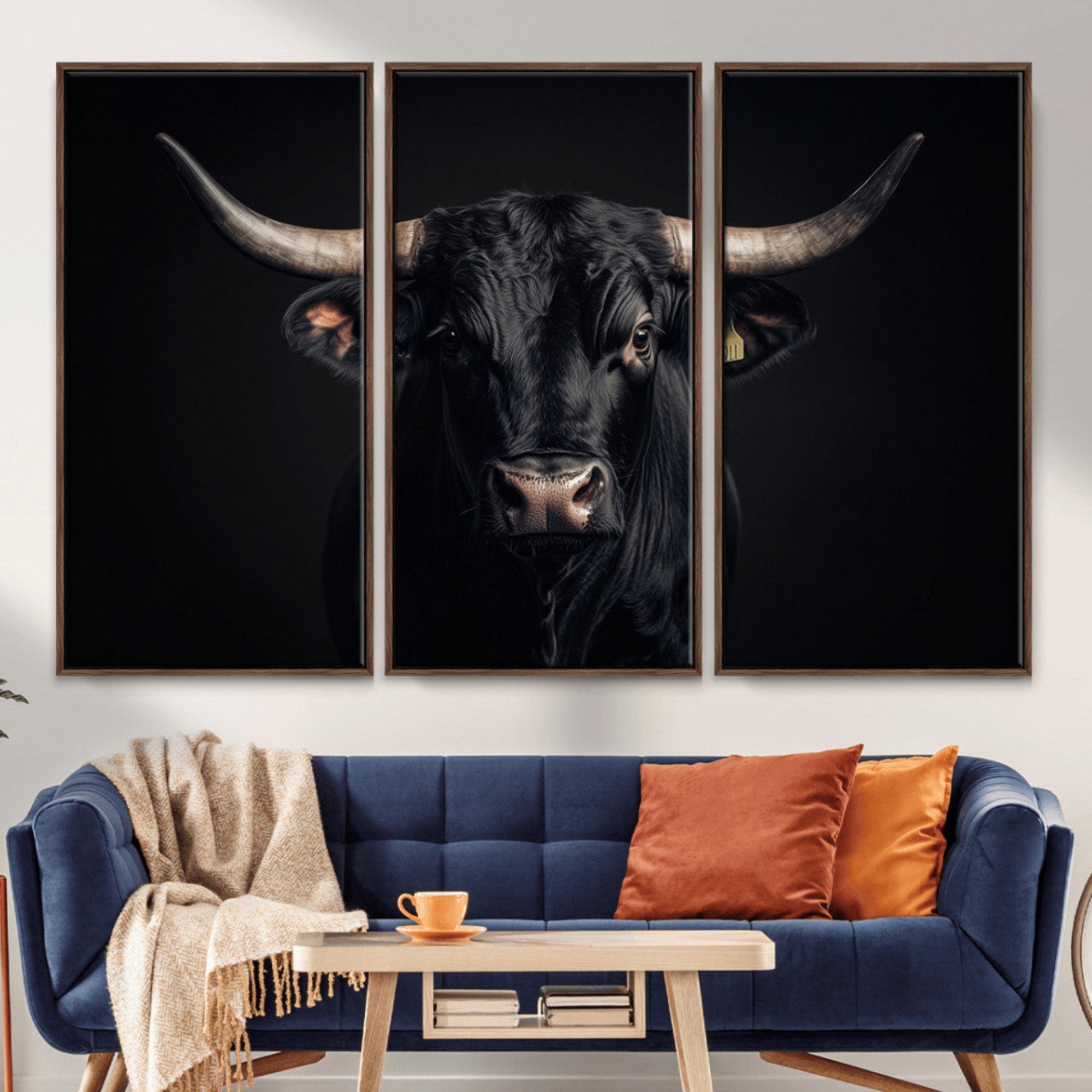 Canvas featuring a black horned bull in moody lighting on a dark background, perfect for western or rustic farmhouse-style home decor.
