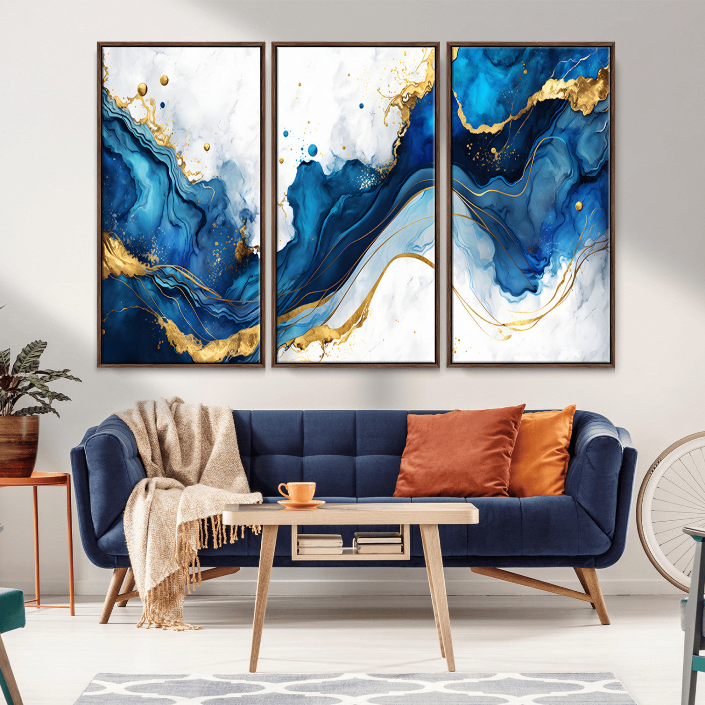 Elegant abstract canvas in cobalt blue and gold tones, featuring marble waves and fluid motion, ideal for luxe interior styling.